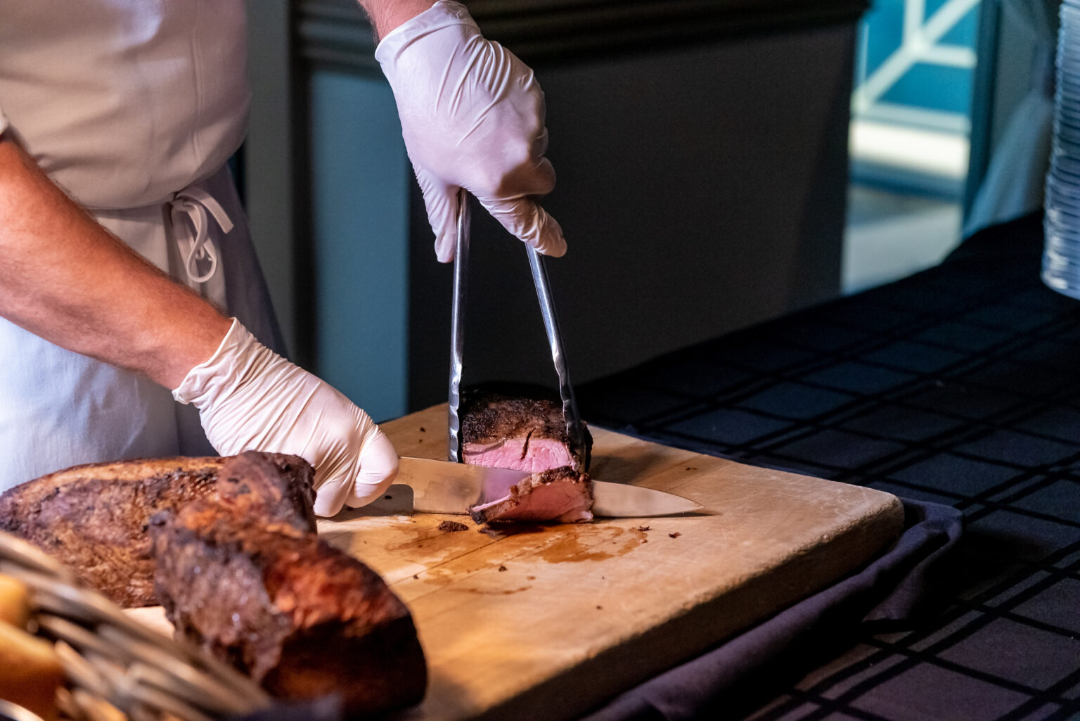 a-closeup-shot-of-the-cook-cutting-a-piece-of-meat-2026-01-11-10-10-50-utc